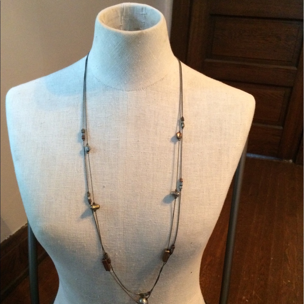 Long multi element necklace